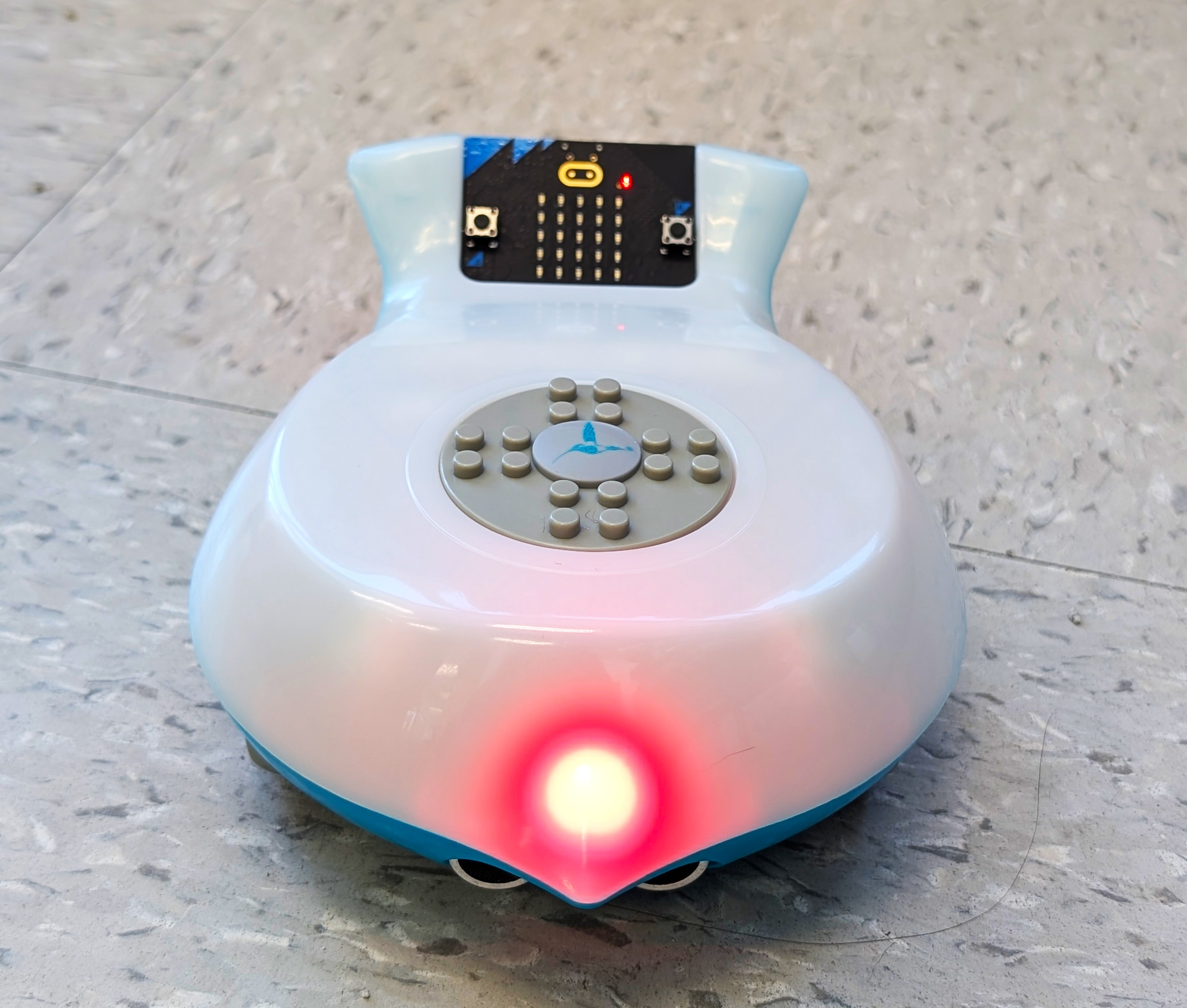 A Finch Robot with a red headlight