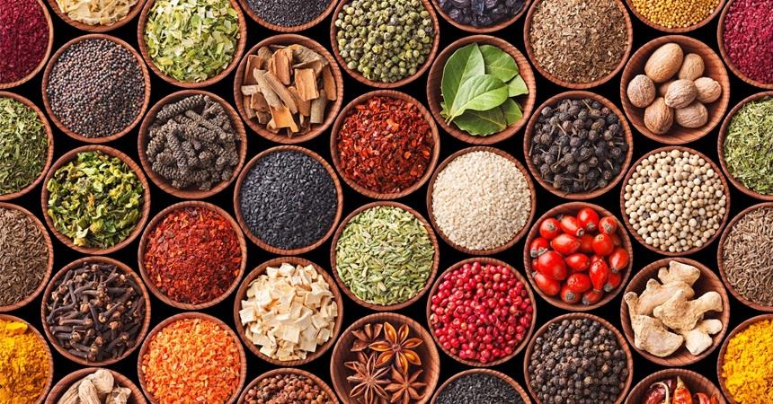 Rows of bowls containing whole spices.
