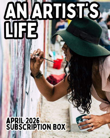 A photo of a woman painting a mural on a wall.