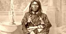 A photo of Modoc leader Kintpuash, known by his English name Captain Jack, in his tribal regalia.
