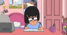 In a scene from the animated series Bob's Burgers, teen Tina Belcher writes fanfiction in a notebook in her room.