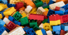 A photo of a large, unsorted pile of Lego bricks.
