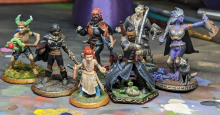 Hand-painted miniature statuettes of a Dungeons and Dragons adventuring party.