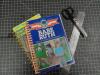 Two spiral-bound notebooks made from a vintage Babe Ruth biography for kids and a Nancy Drew novel.